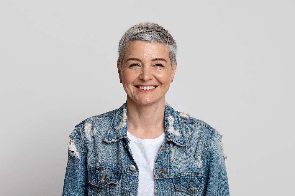 woman smiling after getting a crown apex